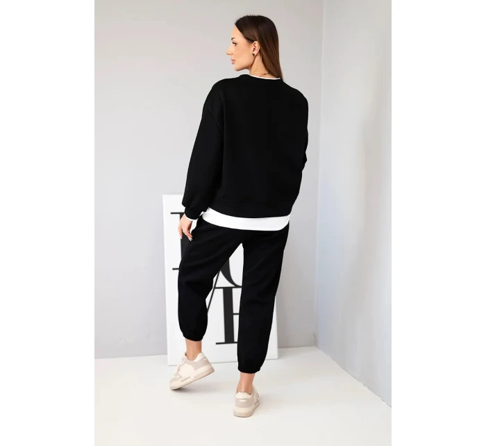 Dámský komplet s volnou mikinou a tepláky černý model 21808615 - K-Fashion Dámský komplet s volnou mikinou a tepláky černý model 21808615 - K-Fashion