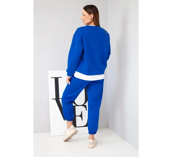 Dámský komplet s s volnou mikinou a tepláky modrý model 21808627 - K-Fashion Dámský komplet s s volnou mikinou a tepláky modrý model 21808627 - K-Fashion