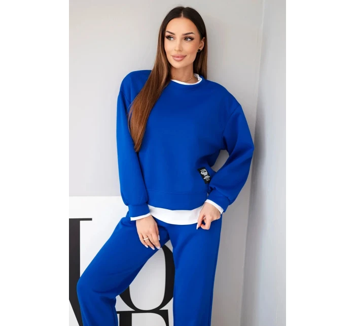 Dámský komplet s s volnou mikinou a tepláky modrý model 21808627 - K-Fashion Dámský komplet s s volnou mikinou a tepláky modrý model 21808627 - K-Fashion