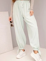 Dámske nohavice so širokými nohavicami a viazaním v spodnej časti tmavá mentolová