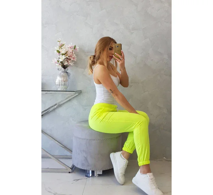 Bavlněné kalhoty žluté neonové