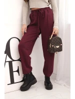 Elegantné nohavice s vysokým pásom a viazaním v páse vo vínovej farbe Elegantné nohavice s vysokým pásom a viazaním v páse vo vínovej farbe