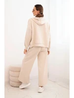 Dámska maslová súprava so širokými nohavicami a mikinou na zips béžová Dámska maslová súprava so širokými nohavicami a mikinou na zips béžová
