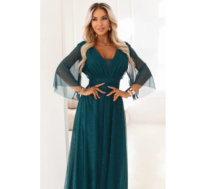 654-1 Dlhé lesklé plus size šaty s výstrihom a priehľadnými rukávmi - fľaškovo zelené 654-1 Dlhé lesklé plus size šaty s výstrihom a priehľadnými rukávmi - fľaškovo zelené