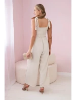 Kombinéza bez ramienok s volánom na vrchu béžová