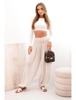 Dámské viskózové kalhoty s širokými nohavicemi a volánky béžový