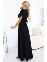 dlouhé šaty s rozparkem na rukávy a výstřihem černé model 21290293 - numoco