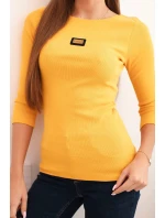 Dámska pruhovaná blúzka s 3/4 rukávmi a ozdobnou aplikáciou v horčicovej farbe Dámska pruhovaná blúzka s 3/4 rukávmi a ozdobnou aplikáciou v horčicovej farbe