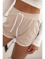 Dámské bavlněné šortky s elastickým pasem a model 21772744 lemem béžové - K-Fashion Dámské bavlněné šortky s elastickým pasem a model 21772744 lemem béžové - K-Fashion