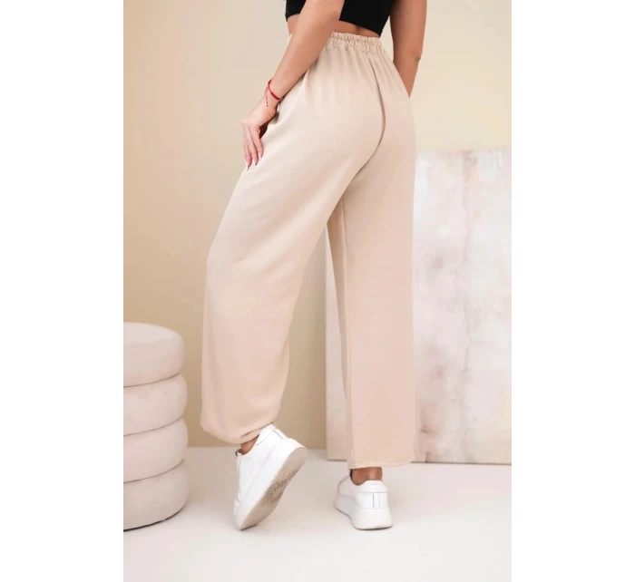 Široké nohavice tmavobéžovej farby