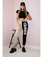 Dámske tepláky s nápisom QUEEN čierne