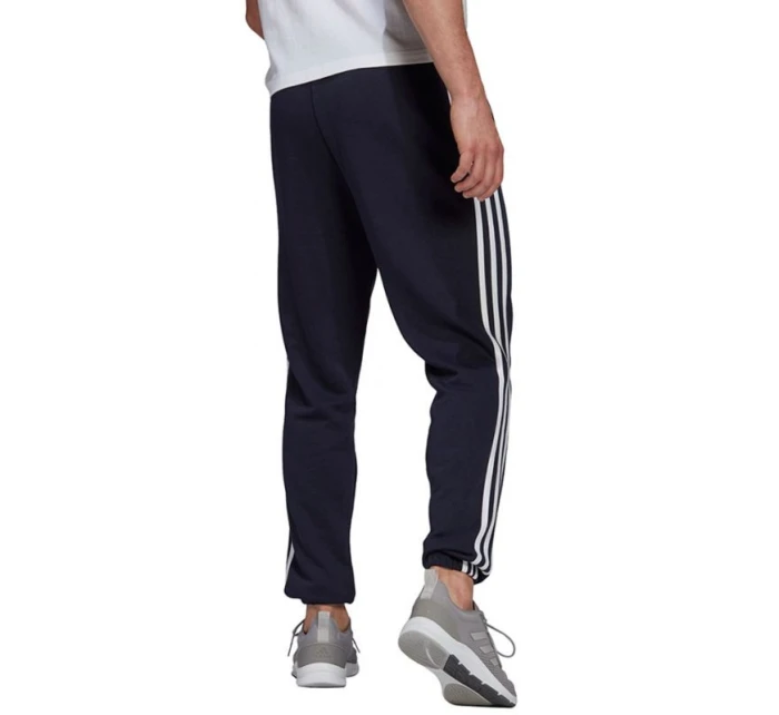 Adidas Essentials Elastické nohavice so zúženými manžetami a 3 prúžkami M GK8830