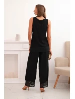 Dámska súprava z viskózy, top so širokými ramienkami a nohavice so širokým strihom čiernej farby Dámska súprava z viskózy, top so širokými ramienkami a nohavice so širokým strihom čiernej farby