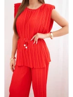 Dámska plisovaná súprava z viskózy s viazanou blúzkou a širokými nohavicami červená