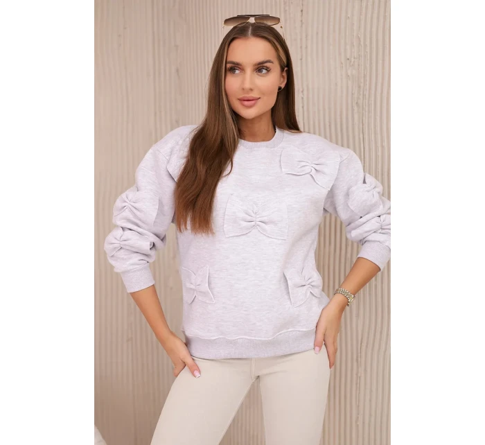 Zateplená bavlněná mikina s ozdobnými mašlemi béžová melanž Zateplená bavlněná mikina s ozdobnými mašlemi béžová melanž