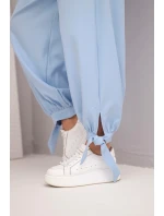 Dámské kalhoty s širokým model 22018656 a zavazováním dole modré - K-Fashion