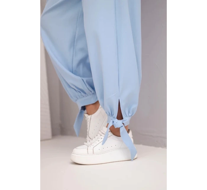 Dámské kalhoty s širokým model 22018656 a zavazováním dole modré - K-Fashion