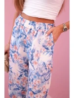 Dámske široké nohavice s kvetinovou potlačou modré