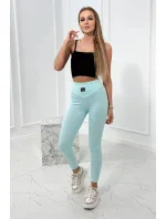 Pruhované mätové legíny