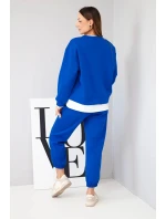 Dámský komplet s s volnou mikinou a tepláky modrý model 21808627 - K-Fashion Dámský komplet s s volnou mikinou a tepláky modrý model 21808627 - K-Fashion