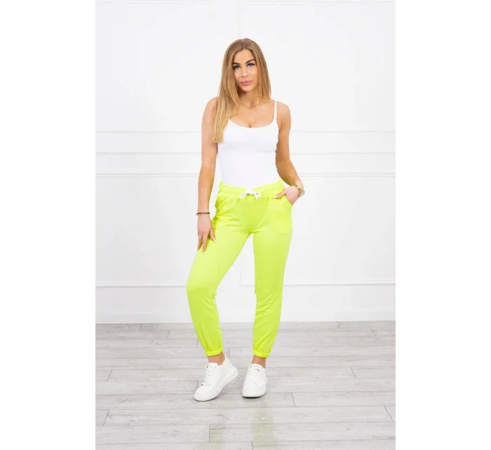 Bavlněné kalhoty žluté neonové