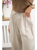 Široké mušelínové nohavice béžovej farby