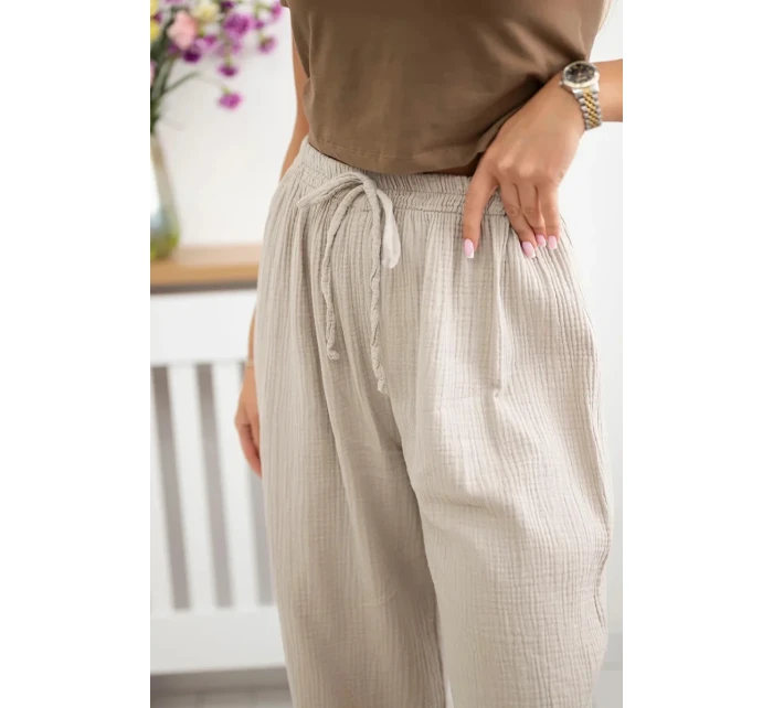 Široké mušelínové nohavice béžovej farby