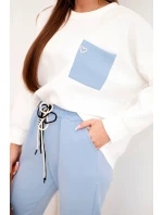 Dámska maslová súprava s kontrastným vreckom modrej farby Dámska maslová súprava s kontrastným vreckom modrej farby