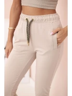 Dámské bavlněné cargo kalhoty s kapsami a řetízkem béžové