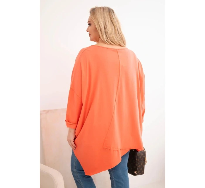 Dámska bavlnená blúzka s asymetrickým lemom a výstrihom do V v marhuľovej farbe Dámska bavlnená blúzka s asymetrickým lemom a výstrihom do V v marhuľovej farbe