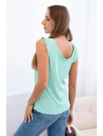 Dámska viskózna blúzka s volánovým výstrihom mätová Dámska viskózna blúzka s volánovým výstrihom mätová