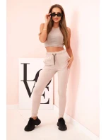 Dámské bavlněné cargo kalhoty s kapsami a řetízkem béžové