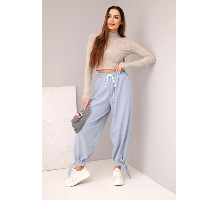 Dámske nohavice so širokými nohavicami a viazaním v spodnej časti džínsovo modré