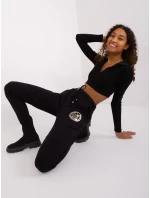 Spodnie dresowe RV DR model 19381345 czarny - FPrice Spodnie dresowe RV DR model 19381345 czarny - FPrice