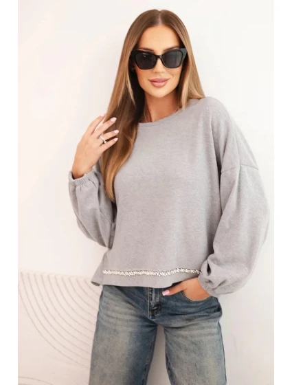 Dámska mikina s ozdobným lemom v spodnej časti sivá Dámska mikina s ozdobným lemom v spodnej časti sivá