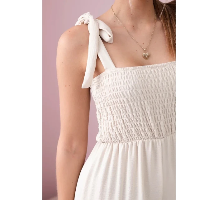 Kombinéza bez ramienok s volánom na vrchu béžová