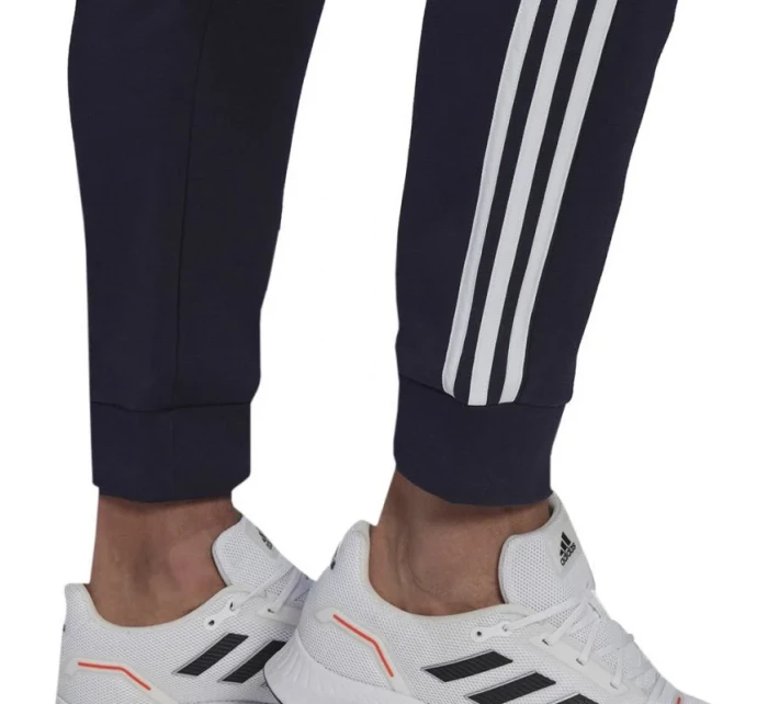 Kalhoty Essentials Colorblock Fleece M model 19575273 - ADIDAS