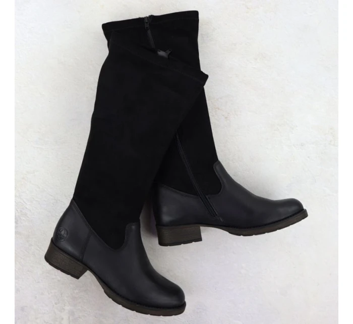 Dámske kožené topánky na klinoch zateplené čierne Rieker 9551