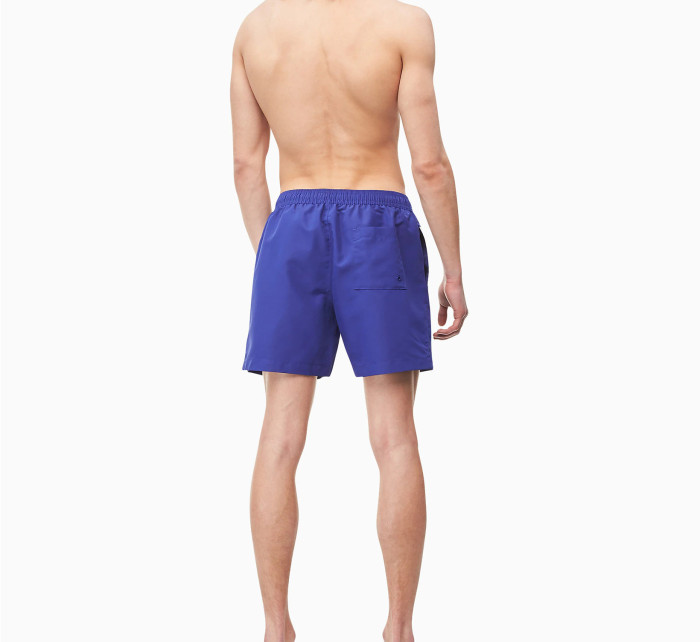 Pánske plavecké šortky KM0KM00403-CDT fialová - Calvin Klein
