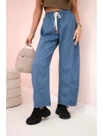 Maslové nohavice zviazané v páse denim meliert