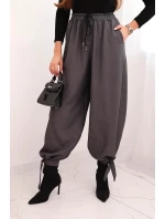 Dámske nohavice so širokými nohavicami a viazaním v spodnej časti graphite Dámske nohavice so širokými nohavicami a viazaním v spodnej časti graphite