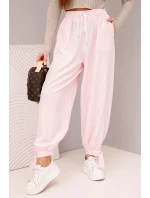 Dámske nohavice so širokými nohavicami a viazaním v spodnej časti candy pink