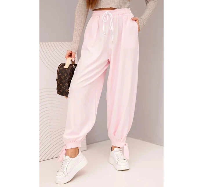 Dámske nohavice so širokými nohavicami a viazaním v spodnej časti candy pink