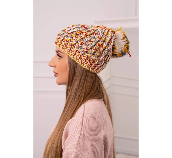 Dámská čepice s bambulí hořčicová model 18751893 - K-Fashion Dámská čepice s bambulí hořčicová model 18751893 - K-Fashion