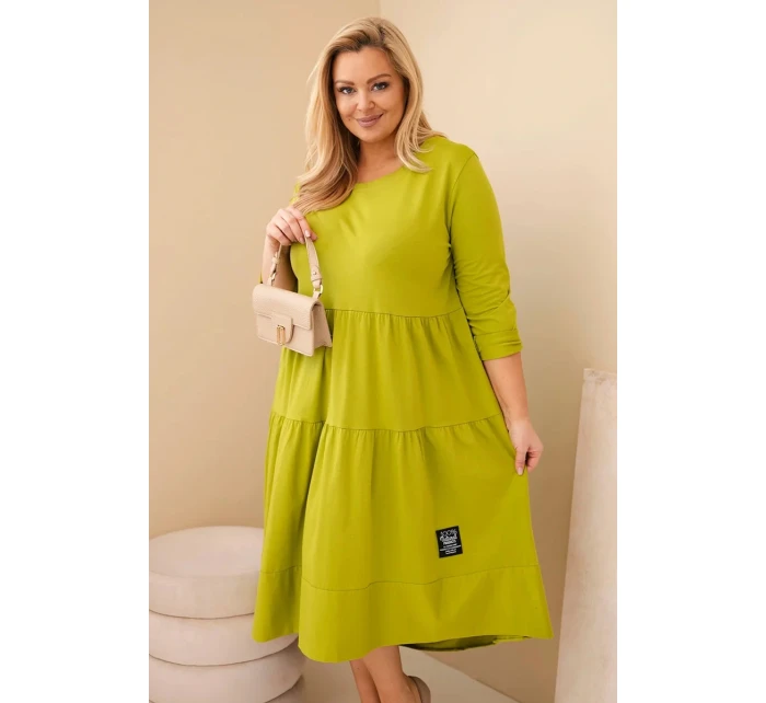 Dámská bavlněná model 22028117 Plus Size s volány a ohrnutým rukávem pistáciová - K-Fashion