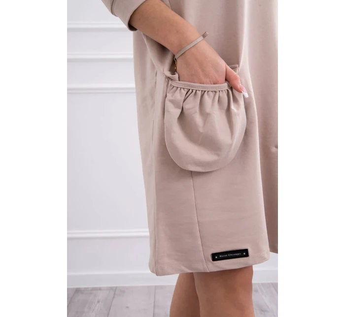 Béžové šaty s kapucí Béžové šaty s kapucí