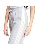 Adidas Essentials 3-Stripes Fleece nohavice voľného strihu W IN6178 ženy Adidas Essentials 3-Stripes Fleece nohavice voľného strihu W IN6178 ženy