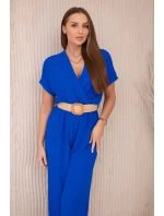 Kombinéza s ozdobným opaskom v páse chrpovo modrá Kombinéza s ozdobným opaskom v páse chrpovo modrá