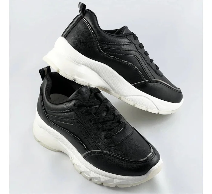 Černé dámské sneakersy s lemovkou model 17139088 Černé dámské sneakersy s lemovkou model 17139088