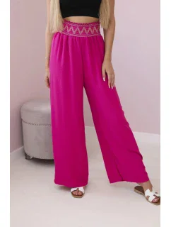 Nohavice so širokým elastickým pásom fuchsiovej farby